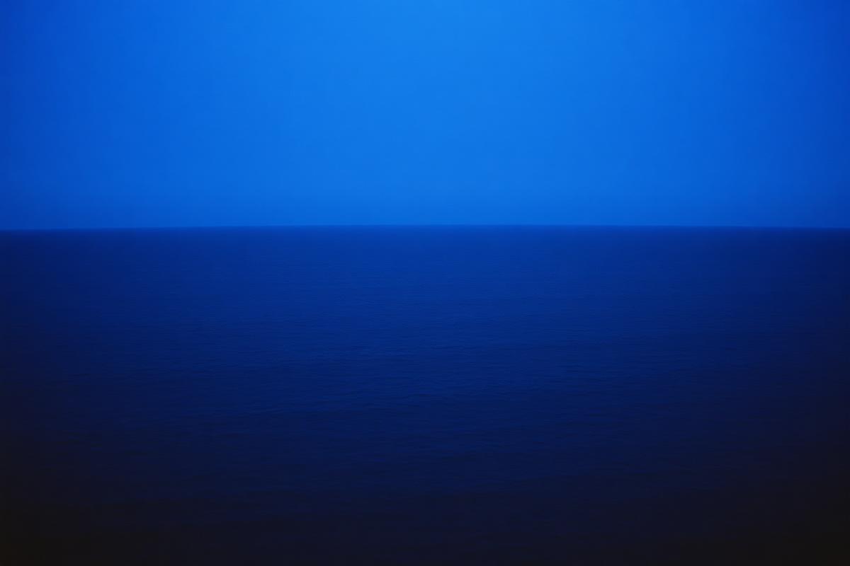 Last band of light over a dark ocean
